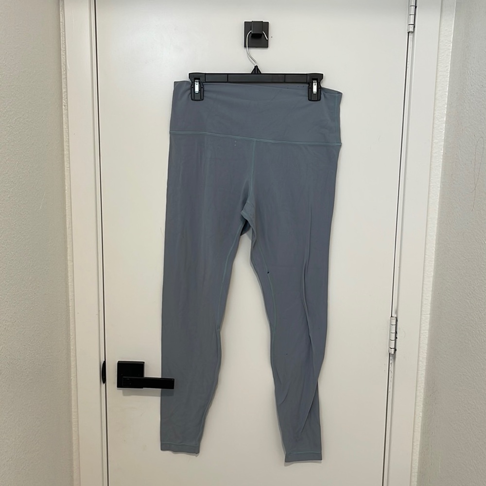 Lululemon gray leggings it has a small stain from laundry